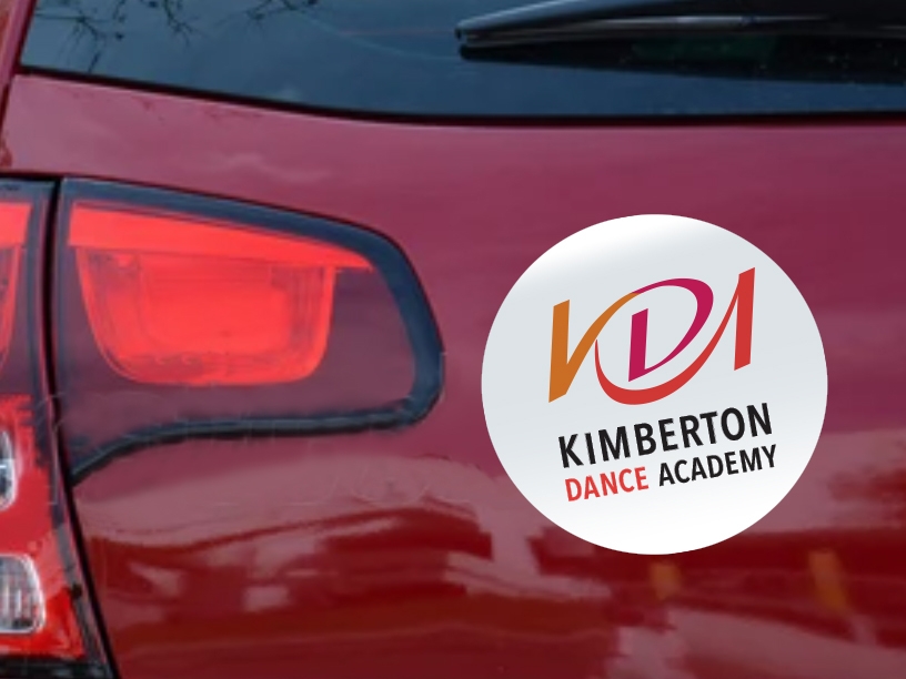 Red version of KDA logo on car magnet